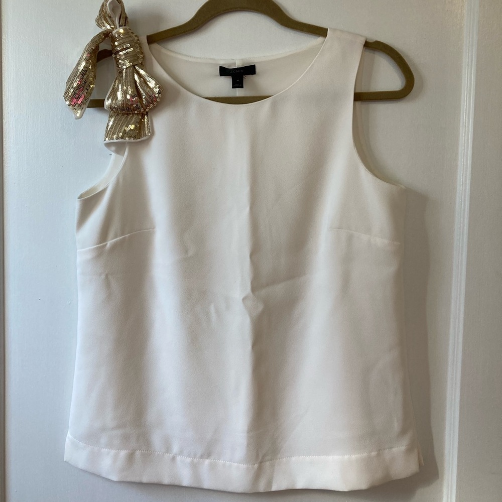 J. Crew White sleeveless top with gold sequin bow on right shoulder, size 4